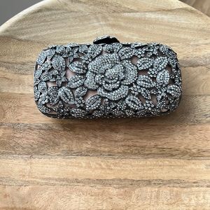 Cache silver, crystal and black diamond clutch